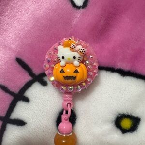 Hello Kitty Pumpkin Badge Reel